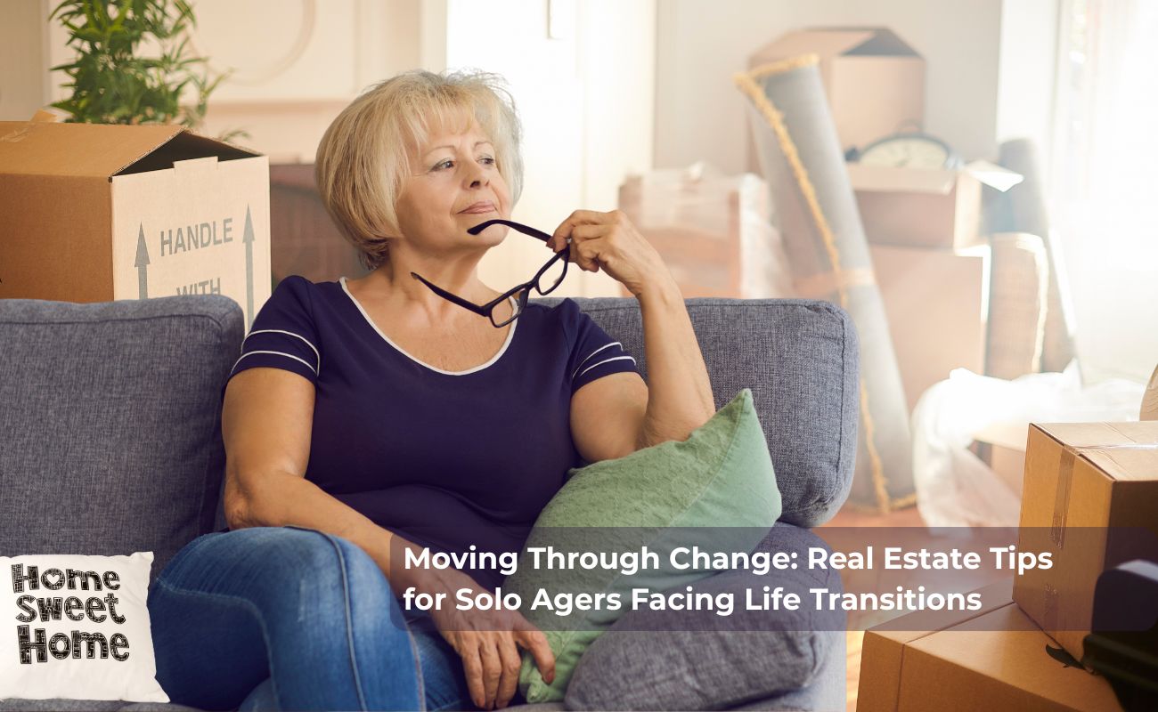Older blonde woman sitting on couch looking contemplative as she stares at a pile of boxes to unpack in her new home. Caption is "Moving Through Change: Real Estate Tips for Solo Agers Facing Life Transitions ."
