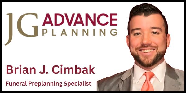 JG Advance Planning business card with smiling man in suit.